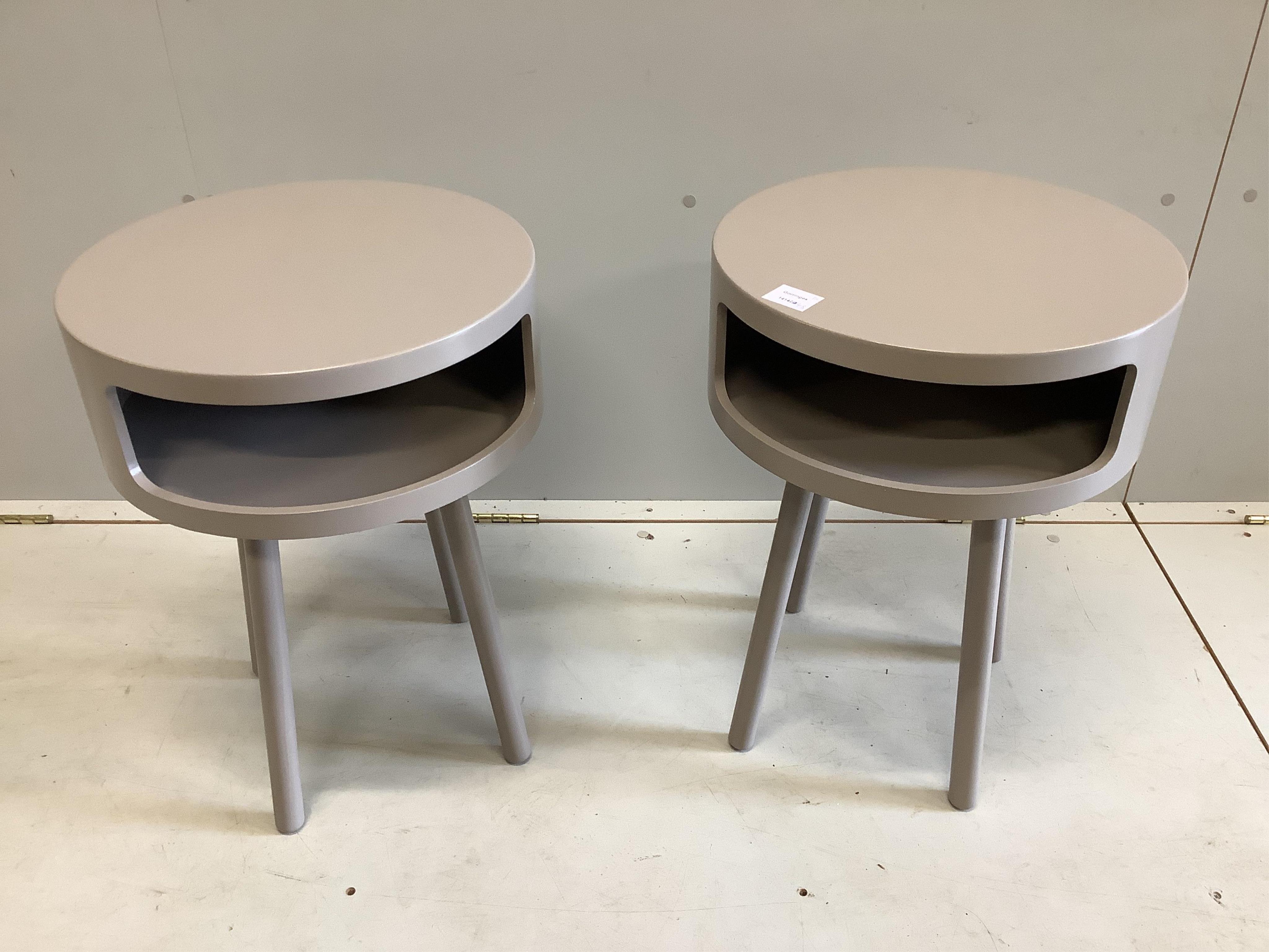 A pair of Habitat 'Bumble' grey bedside tables, diameter 40cm, height 56cm